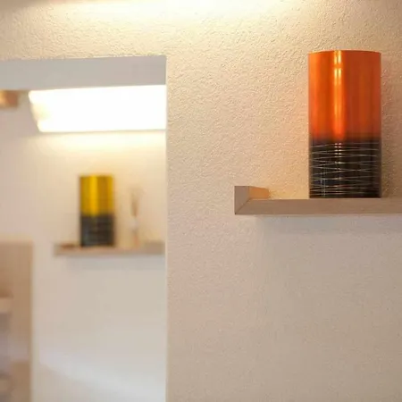 By Apartment